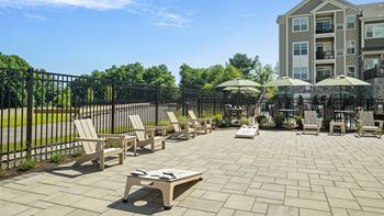 Gated Pool Area with Lounge Seating, Benches and Tables